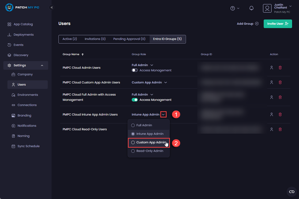 Clicking the dropdown arrow in the “Group Role” column beside the group whose role you want to modify and selecting the new role
